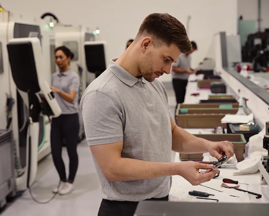 Person looking at a mobile part