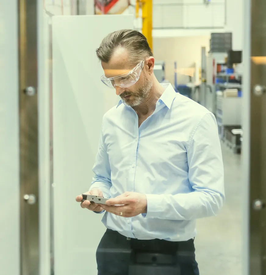 A man holding computer parts